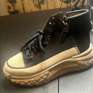 Stylish Black and Cream High-Top Sneakers
